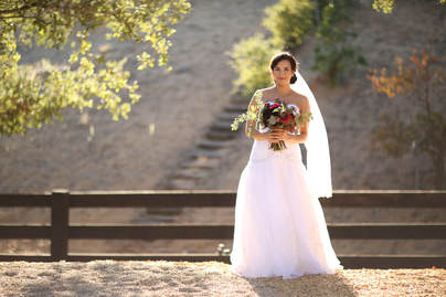 Bride holding a bouquet at this intimate wedding in Murrieta