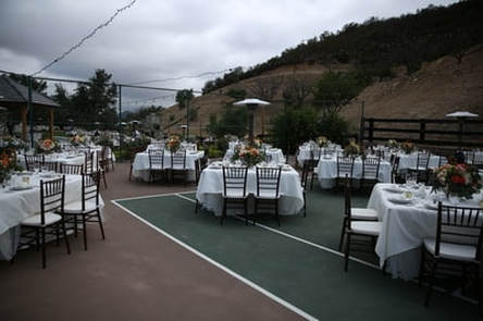 Square tables set at this intimate wedding.
